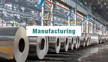 Manufacturing plant with the word Manufacturing over it for Manufacturing Case Studies