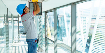 Man servicing HVAC equipment